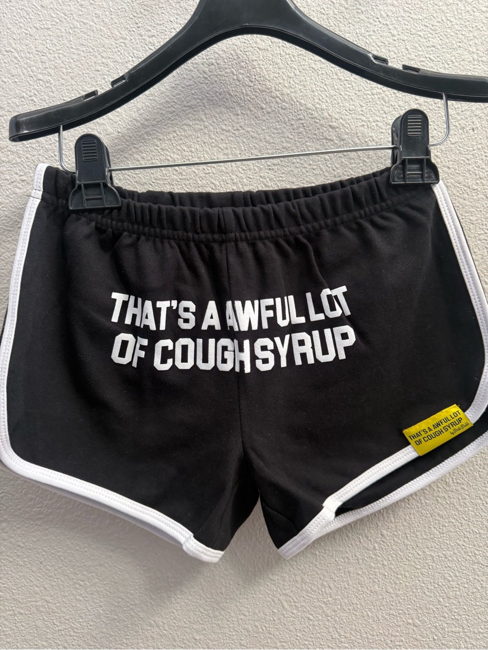 Black Athletic Shorts with White Trim - Graphic Text